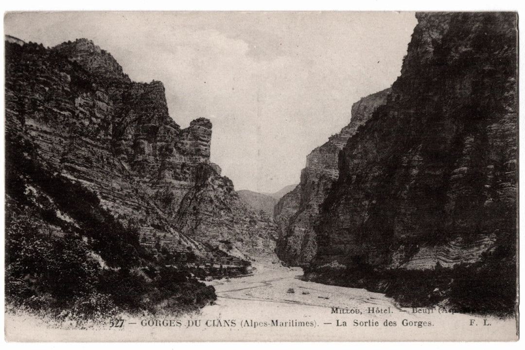 Vintage black and white photograph of a canyon with steep cliffs and a narrow path. Exit of the Gorge Cians River Alps Beuil France .