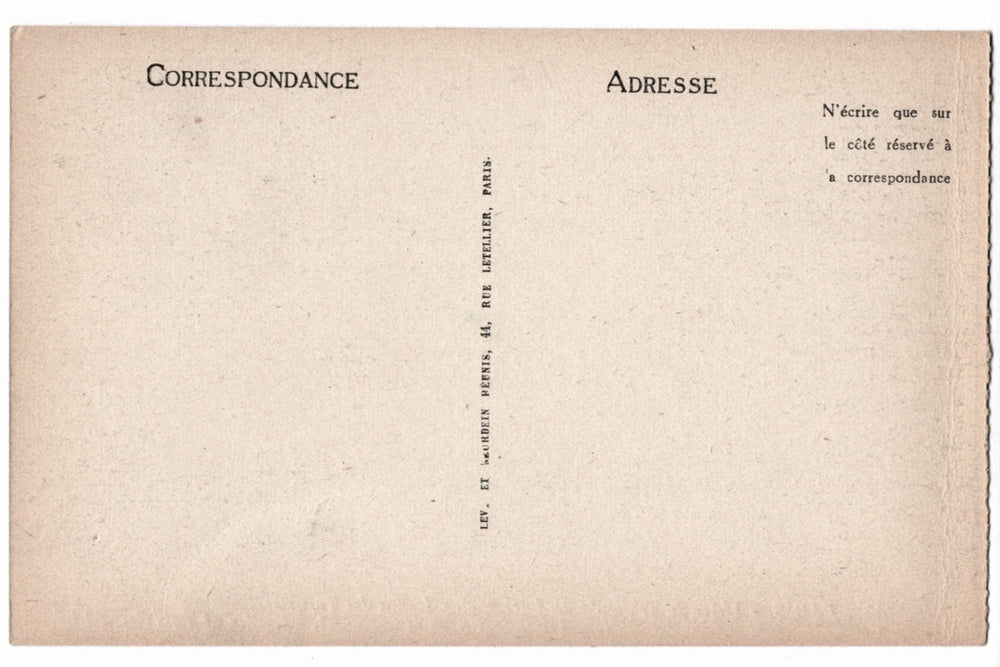 Back of a vintage buff postcard with printed text in French.