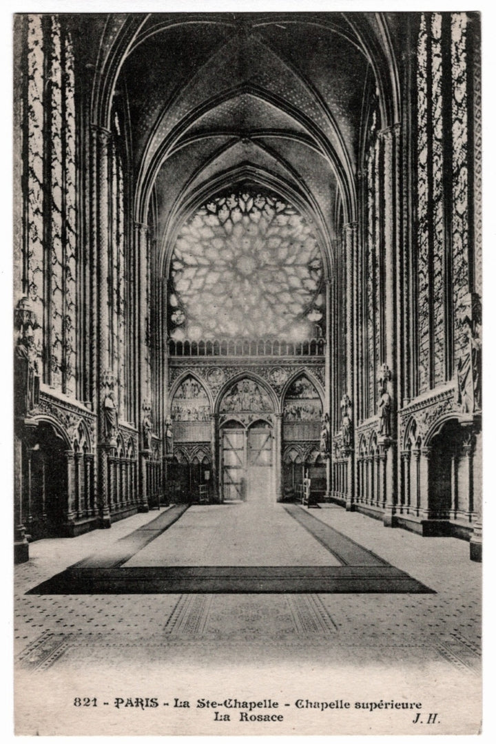 1910s Paris France Sainte-Chapelle Upper Chapel Rose Window Vintage Postcard. The perspective looks down the nave toward the western entrance, showing the intricate tile floor and the sculpted figures of the apostles along the pillars.