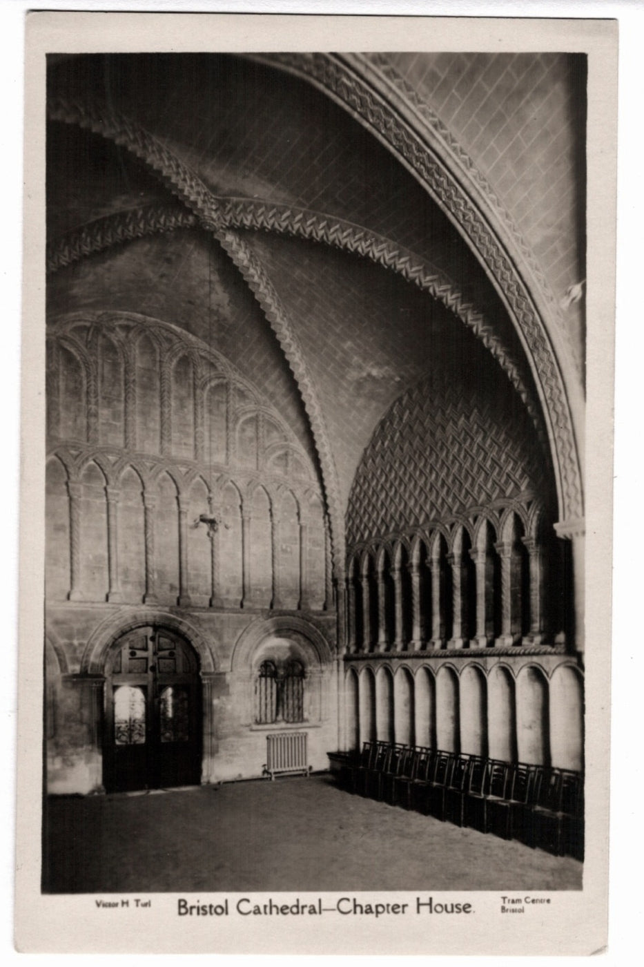 Chapter House interior of Bristol Cathedral with arched ceilings and columns.