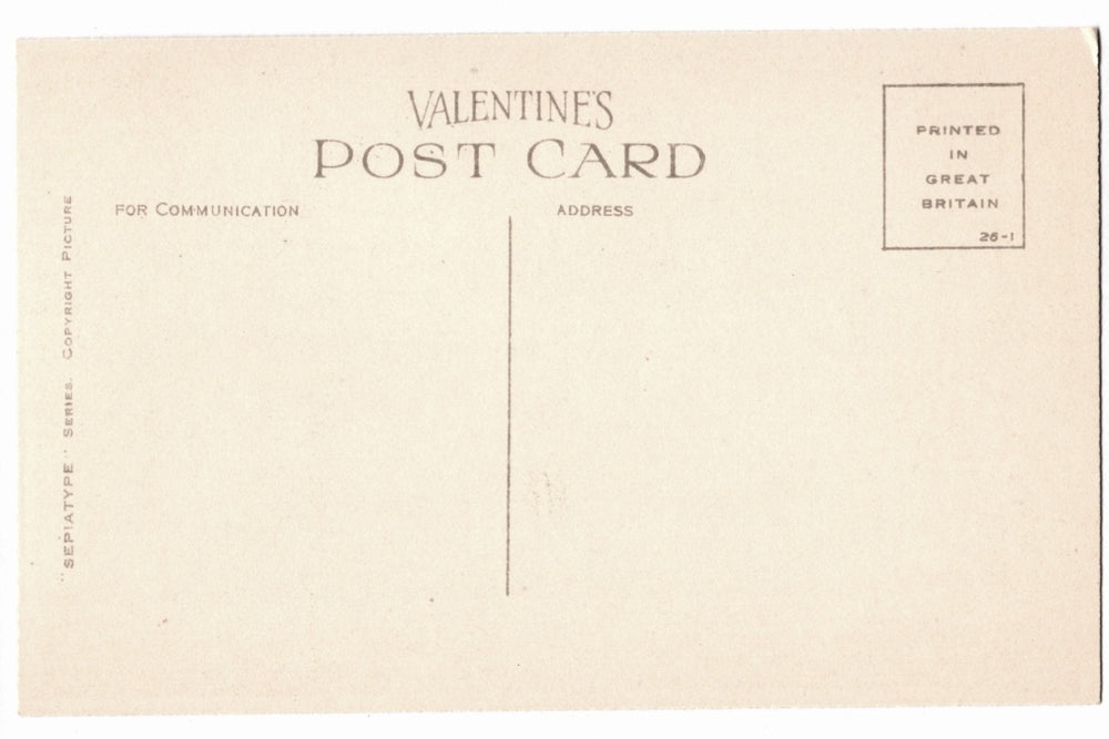 Back of postcard with text and a small square logo.