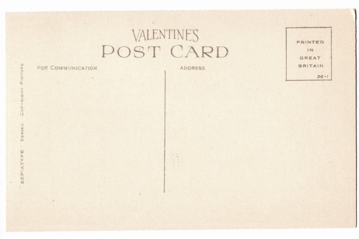 Back of postcard with text and a small square logo.