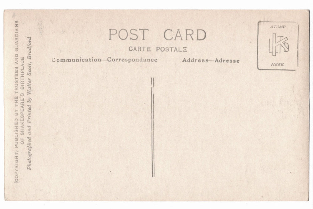 Back of a vintage postcard with text and design elements.