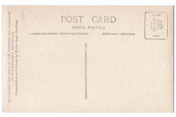 Back of a vintage postcard with text and design elements.