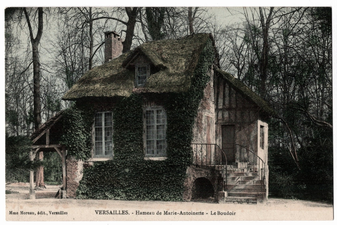 Thatched-roof cottage with ivy coverage in a forested area, Versailles, France. 1900s Versailles Queen's Hamlet Marie-Antoinette Vintage Postcard.