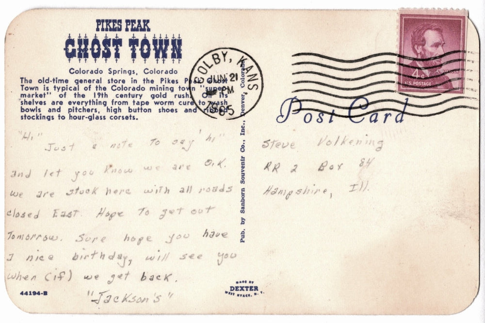 back of vintage postcard from Pikes Peak Ghost Town with text and postage stamp