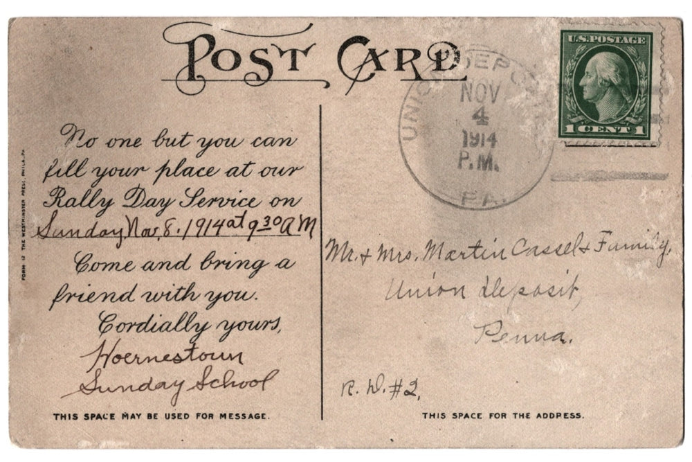 Vintage postcard with text and postage stamp.