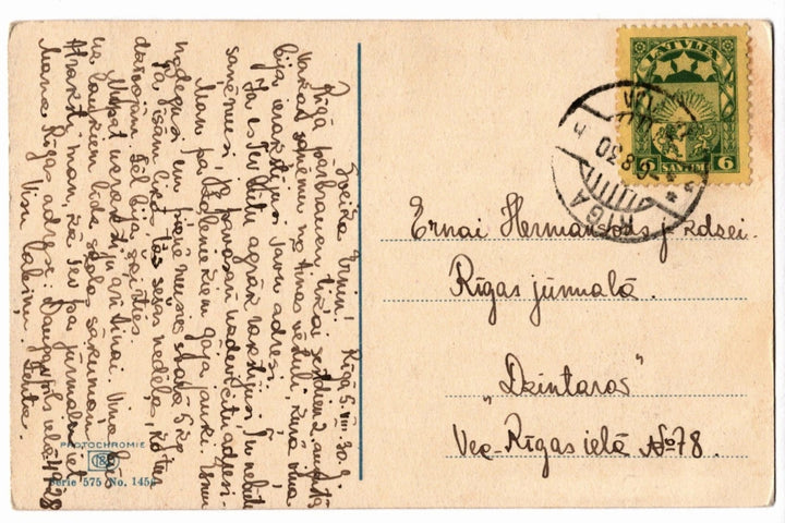 Vintage postcard with text and osted with a 6 santimi Latvian stamp.