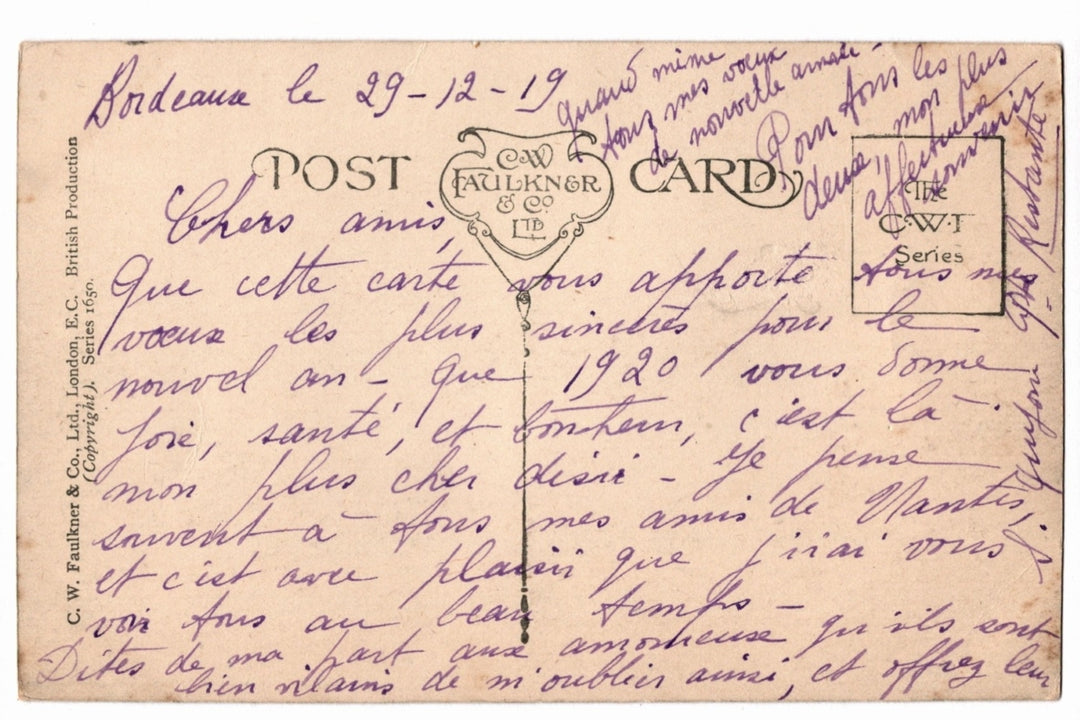 Back of a vintage postcard with text and address lines.