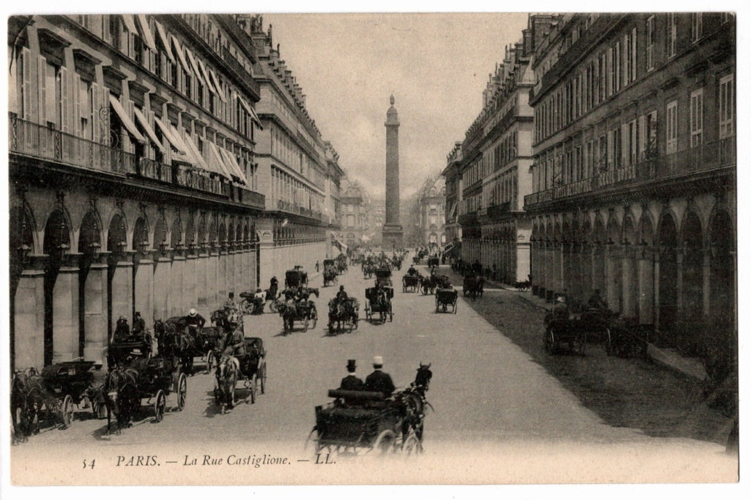 Vintage postcard of a street scene in Paris with horse-drawn carriages and a monument in the distance; 1905 Rue de Castiglione Paris France Vintage Postcard.