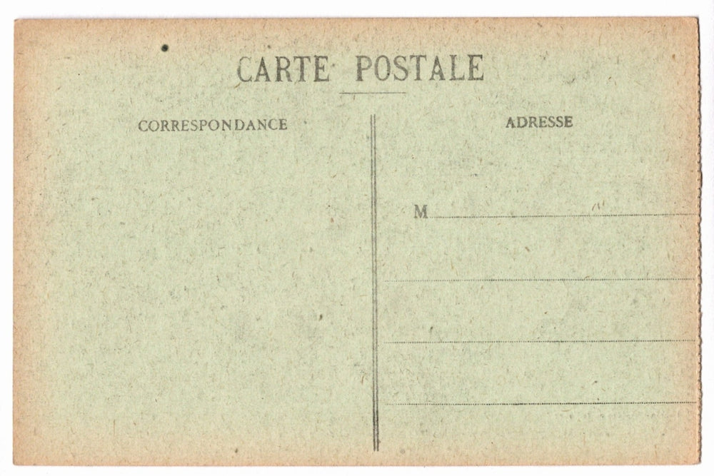 Back of a vintage postcard with text and address lines.