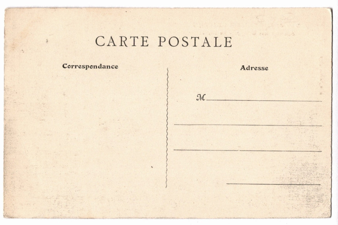 Back of a vintage postcard with text and address lines.