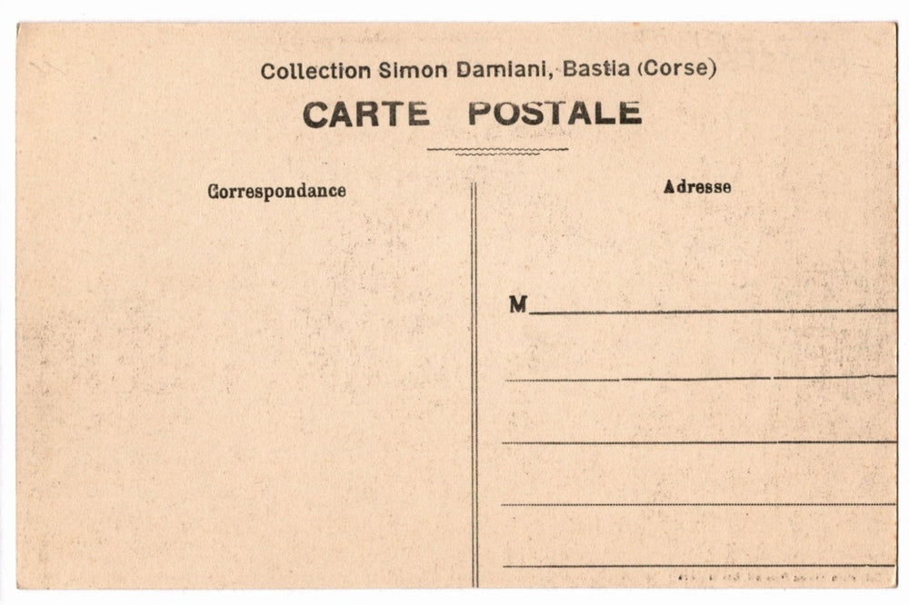 Back of a vintage postcard with text and address lines.