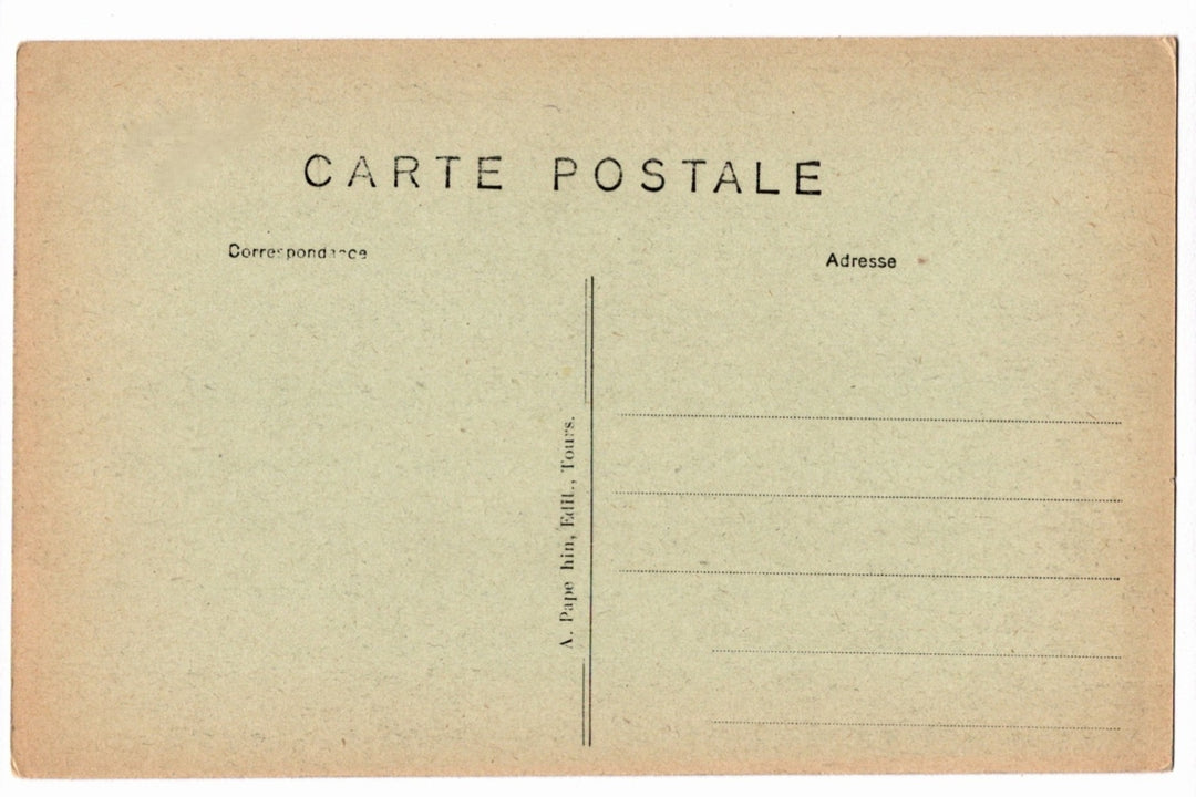 Back of a vintage postcard with text and address lines.