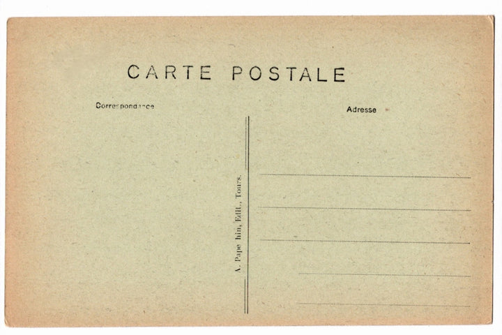 Back of a vintage postcard with text and address lines.