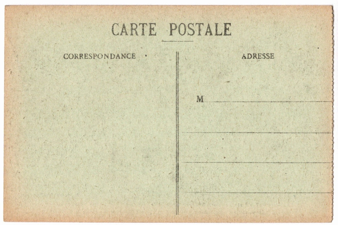 Back of a vintage postcard with text and address lines.