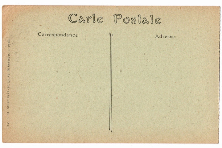 Back of a vintage postcard with text and address lines.