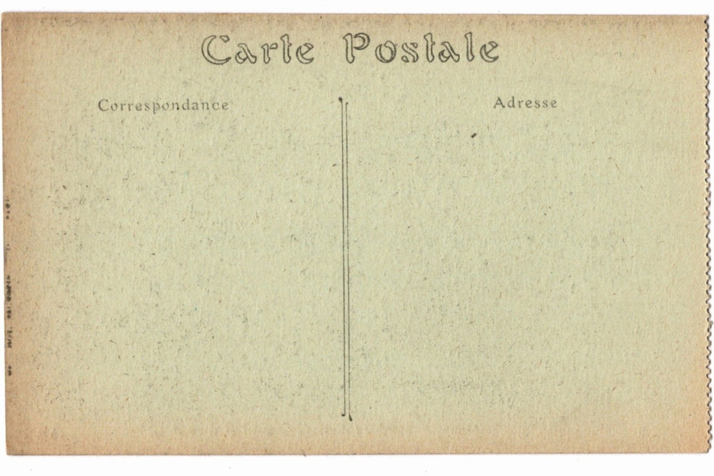 Back of a vintage postcard with text and address lines.