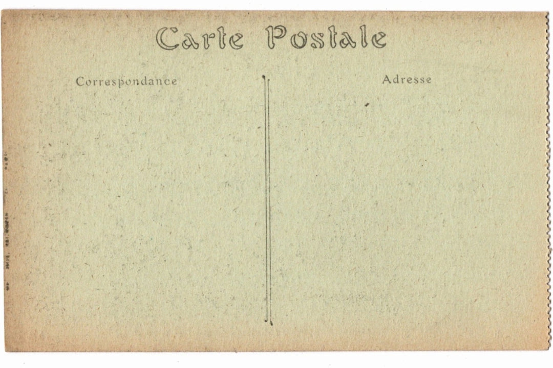 Back of a vintage postcard with text and address lines.