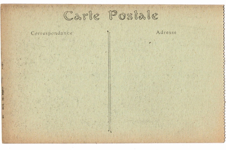 Back of a vintage postcard with text and address lines.
