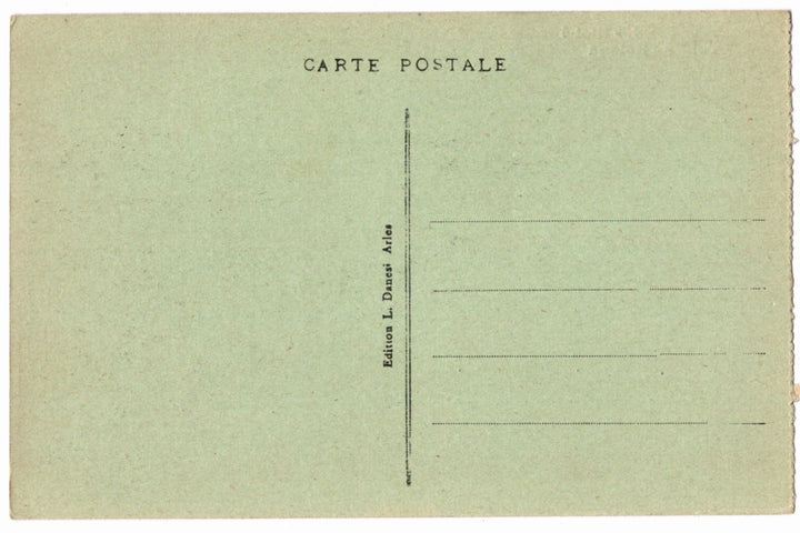 Back of a vintage postcard with 'Carte Postale' text and a line for writing a message.