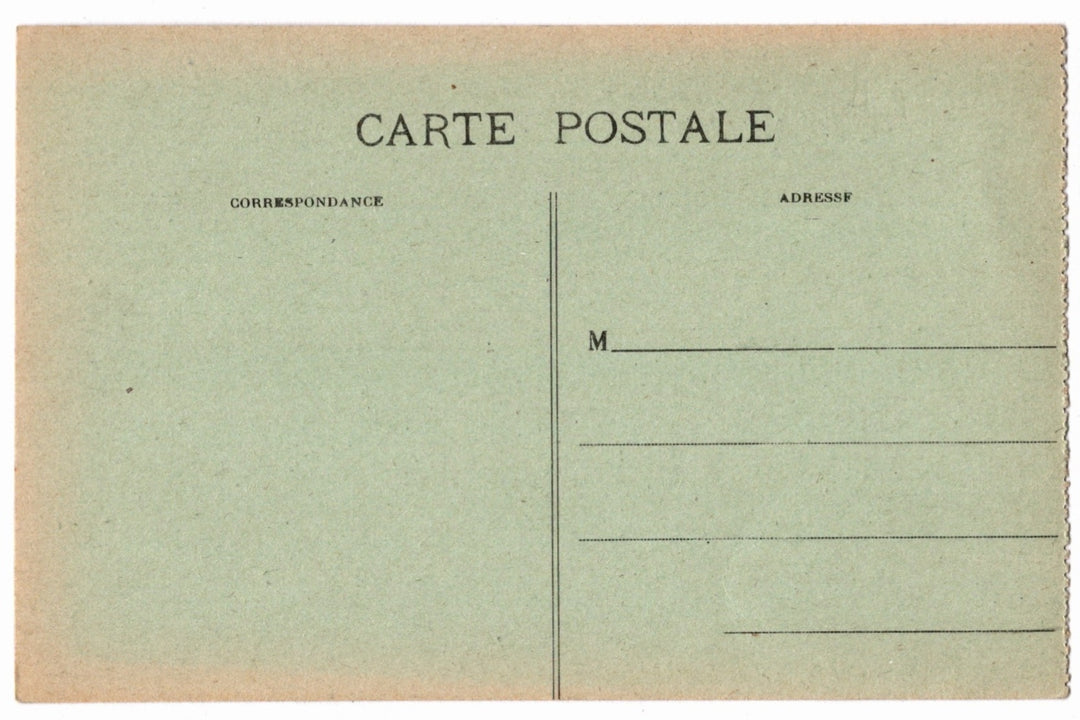 Back of a vintage postcard with text and address lines.