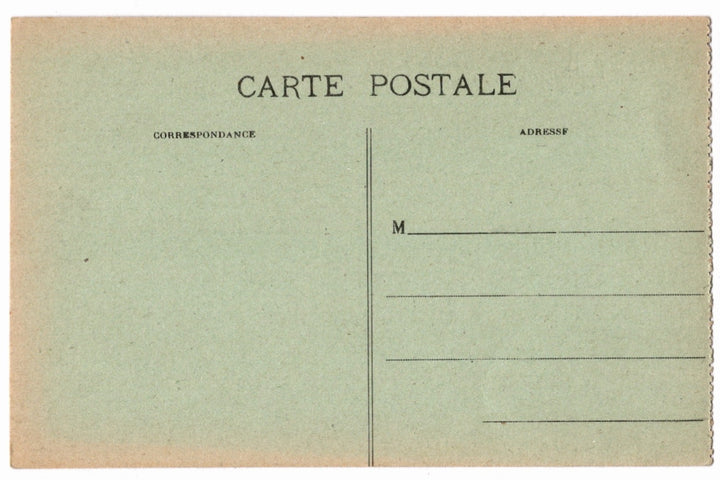 Back of a vintage postcard with text and address lines.