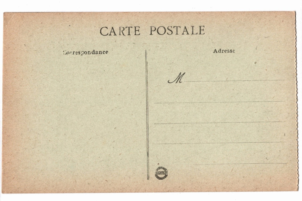 Back of a vintage postcard with text and address lines.