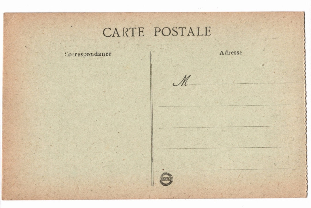 Back of a vintage postcard with text and address lines.