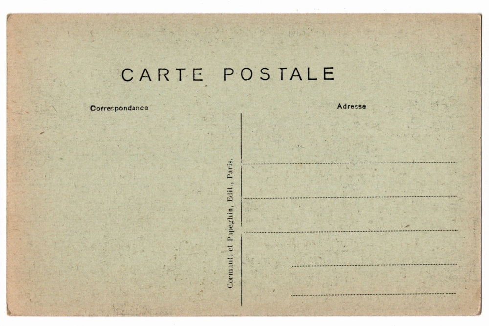 Back of a vintage postcard with text and address lines.