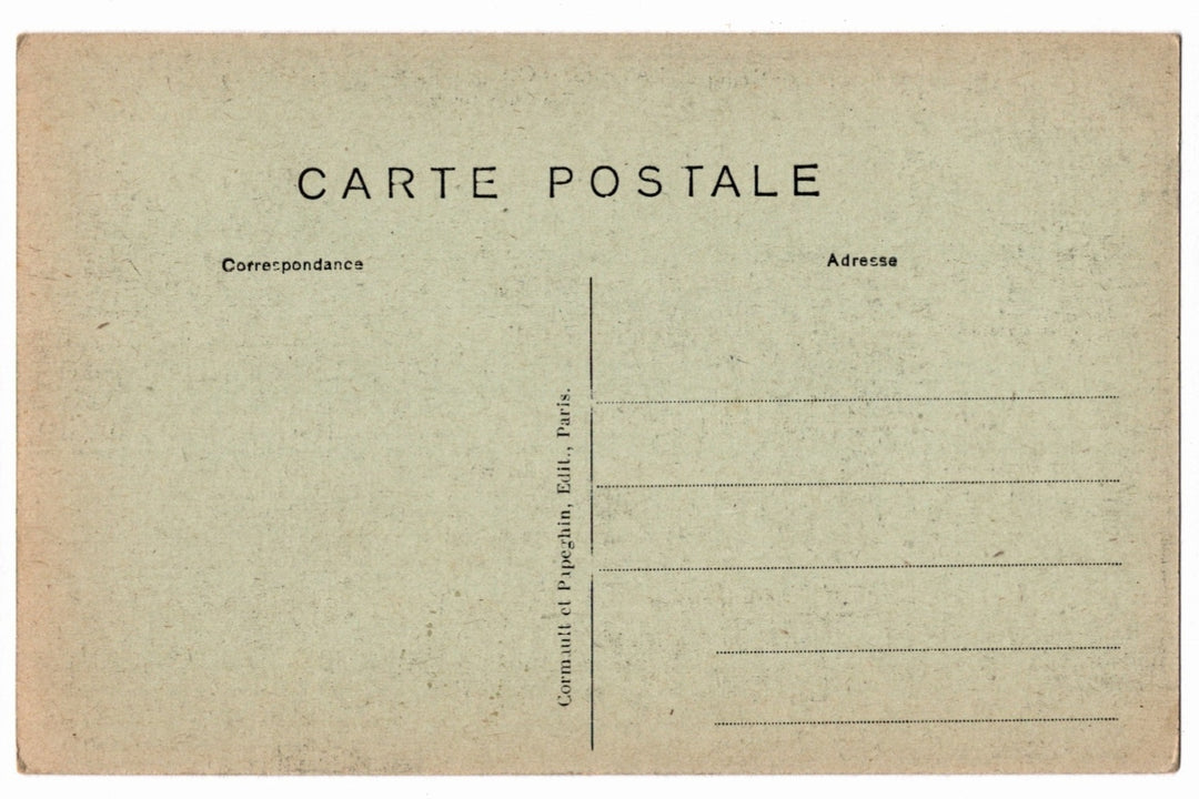 Back of a vintage postcard with text and address lines.