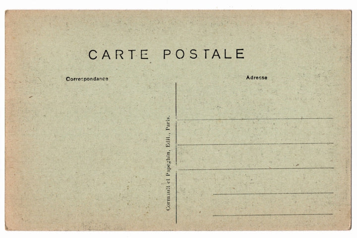 Back of a vintage postcard with text and address lines.