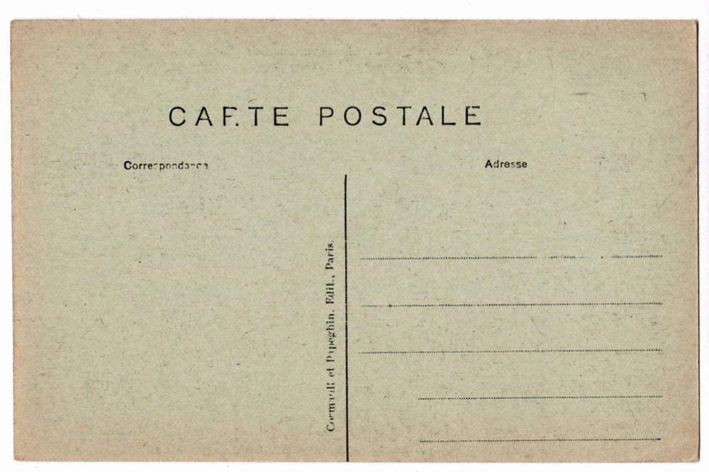 Back of a vintage postcard with text and address lines.