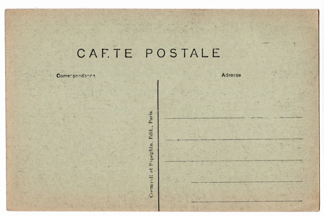 Back of a vintage postcard with text and address lines.