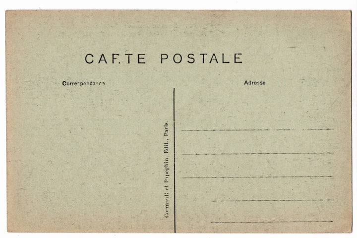 Back of a vintage postcard with text and address lines.