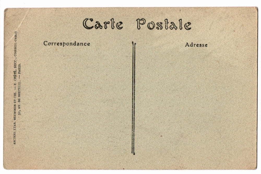 Back of a vintage postcard with text and address lines.