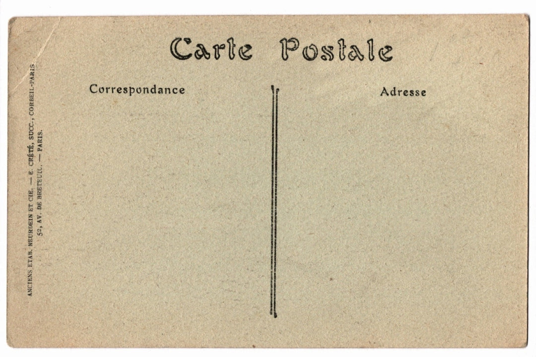 Back of a vintage postcard with text and address lines.