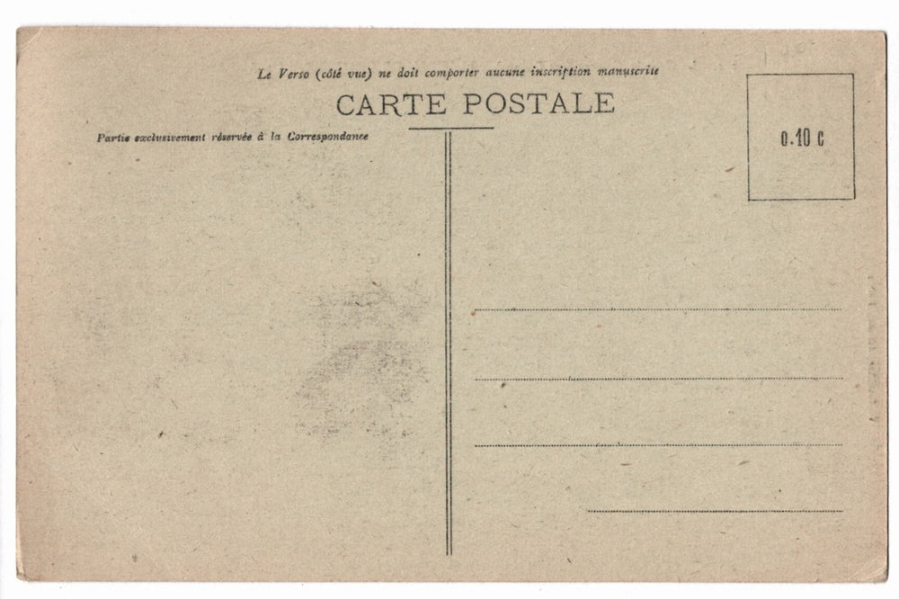 Back of a vintage postcard with text and address lines.