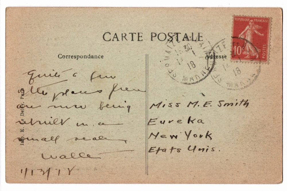 Vintage postcard with text and postage stamp, addressed to Miss M.E. Smith in New York.