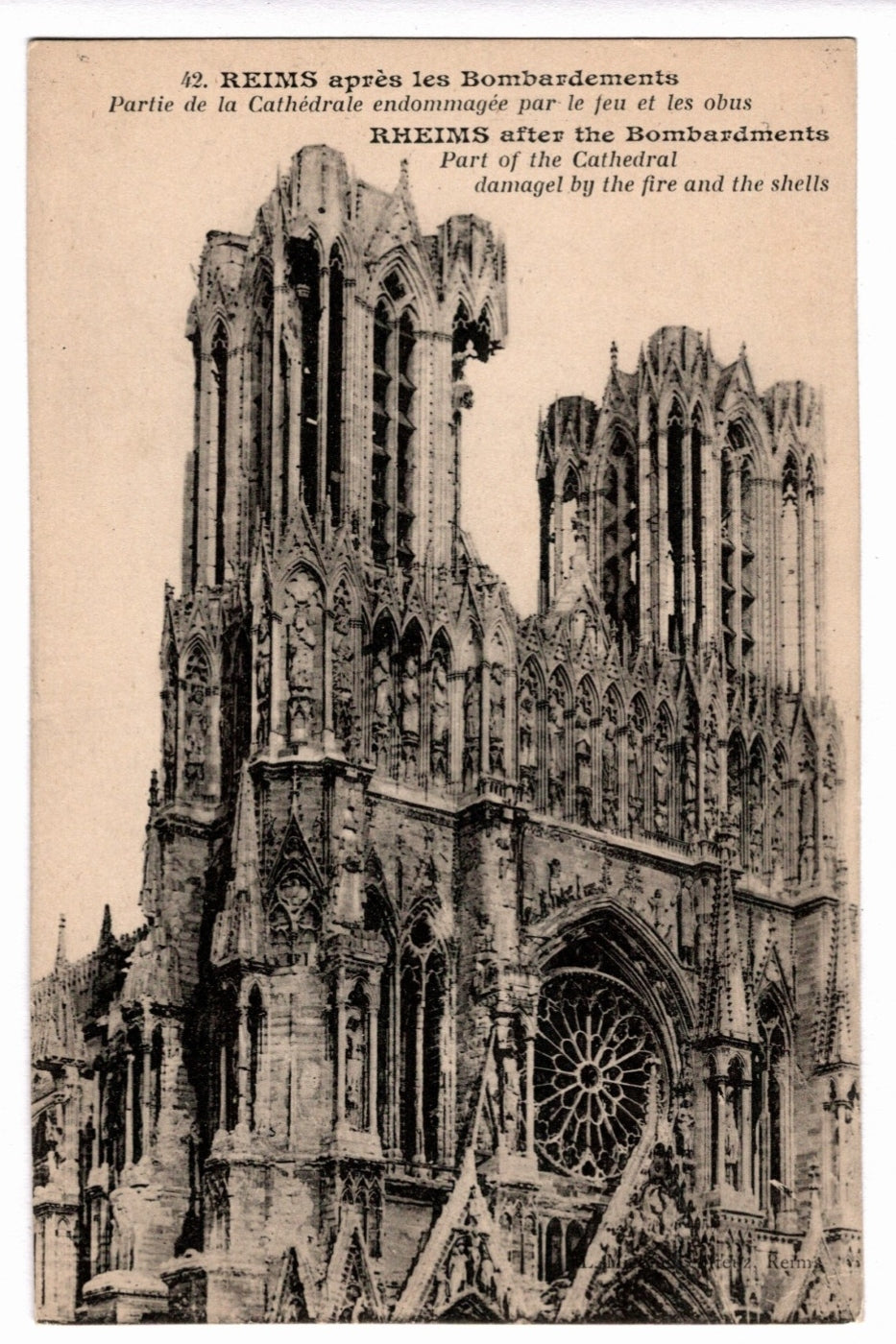 Vintage postcard of Reims Cathedral after bombardments, showing damage to the facade.