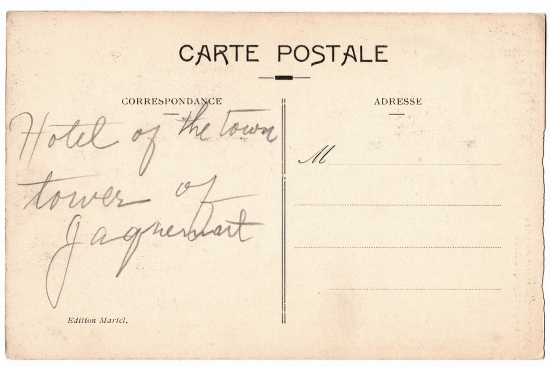 Vintage postcard with handwritten text on a beige background