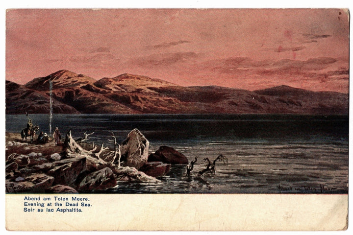 Vintage postcard of a scene at the Dead Sea with mountains and water.