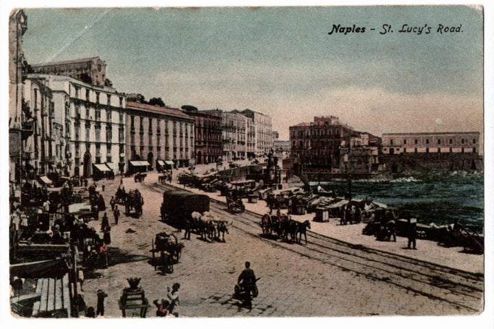 Vintage postcard of a bustling street scene in Naples with horse-drawn carriages and buildings. 1905 Naples St. Lucy's Road and Waterfront Vintage Postcard.