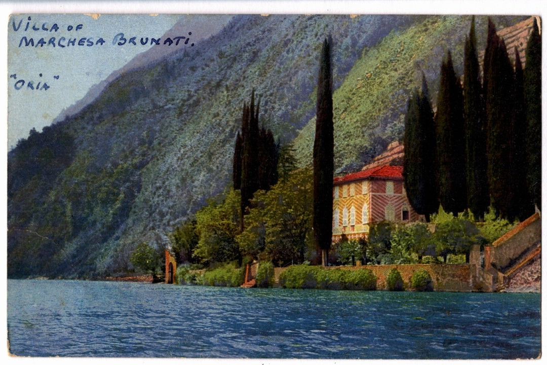 Villa Marchesa Brunati on a mountain overlooking a lake with cypress trees vintage postcard.