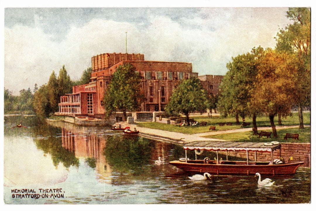 Memorial Theatre in Stratford-upon-Avon with a lake and boats in the foreground