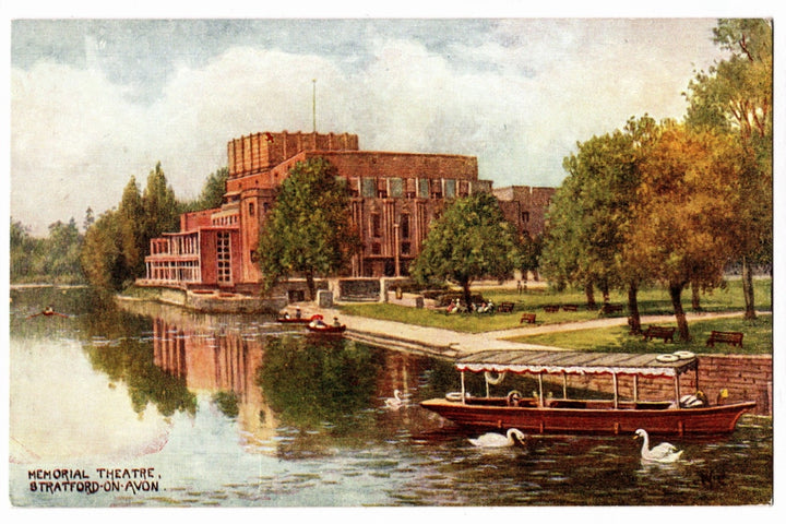 Memorial Theatre in Stratford-upon-Avon with a lake and boats in the foreground