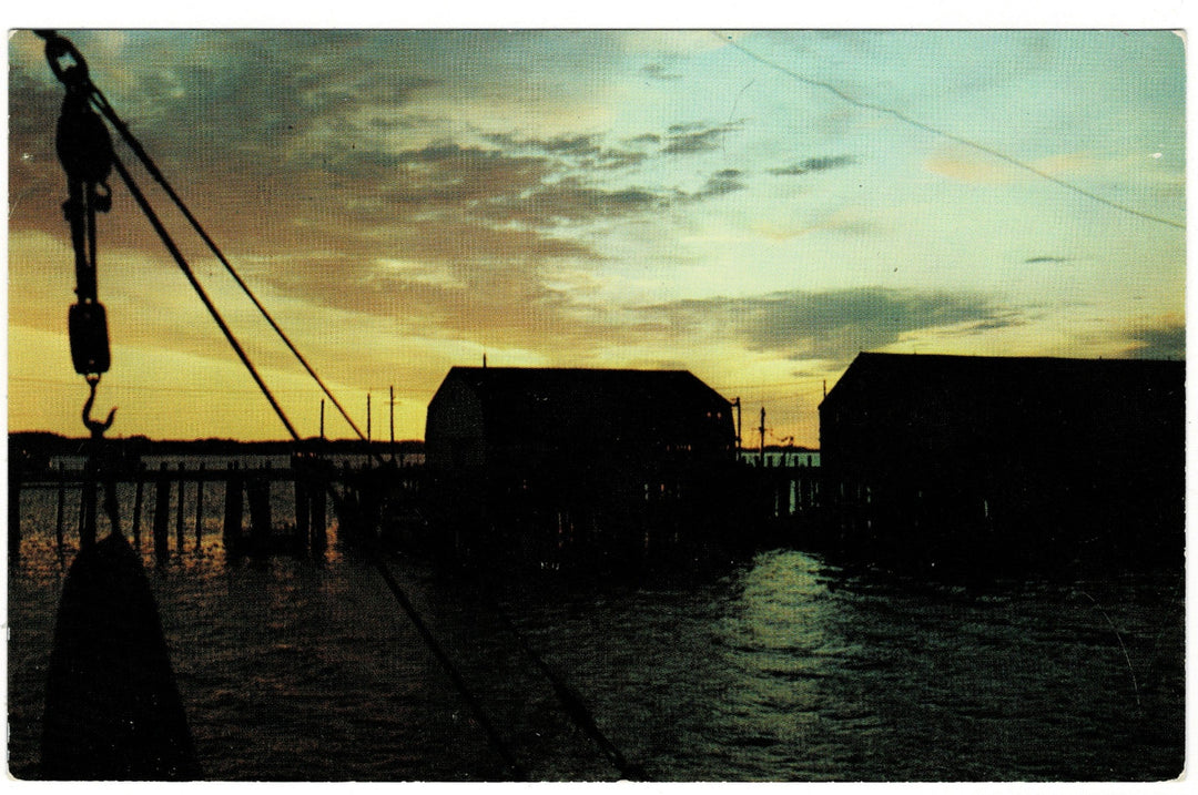 1950s Cape Cod Wharfs at Sunset Massachusetts Vintage Postcard.