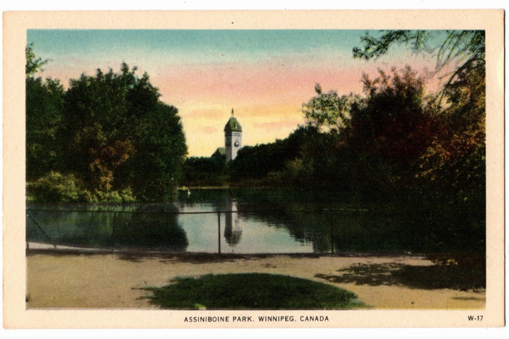 Vintage postcard of Assiniboine Park in Winnipeg, Canada with a clock tower and lake.