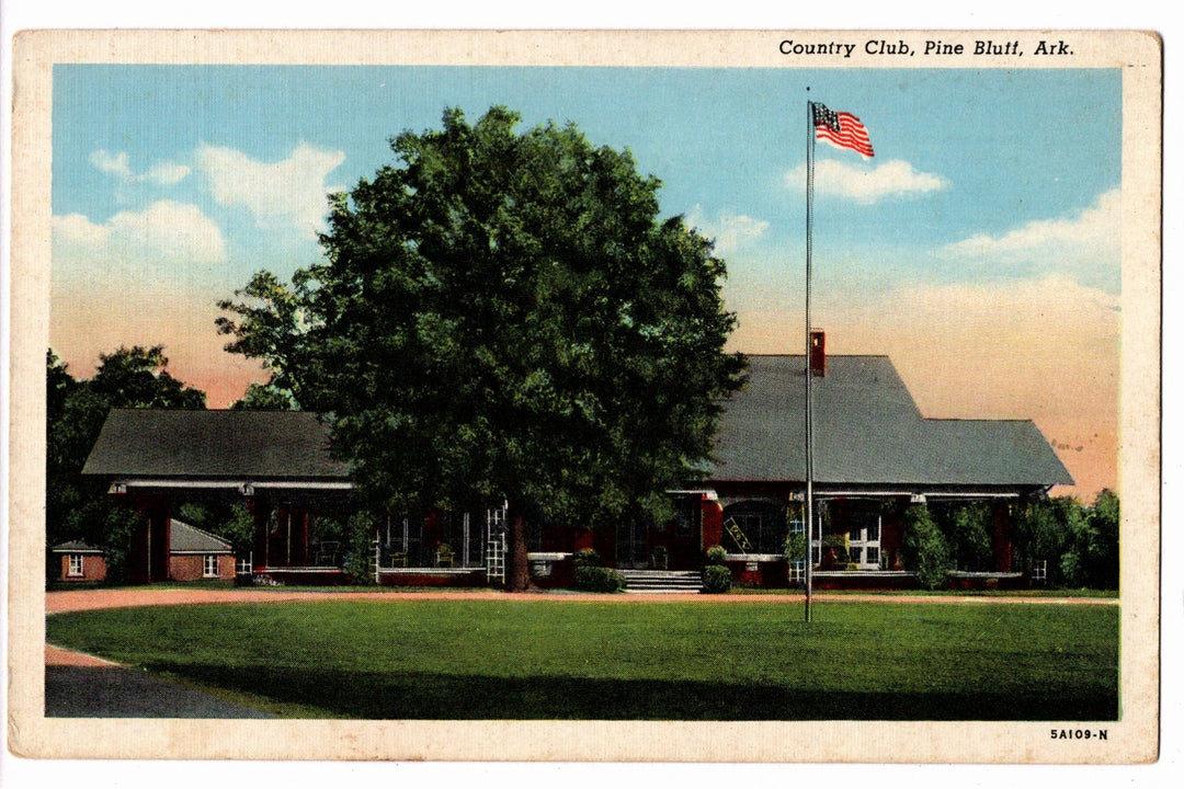Vintage postcard of a Country Club building with an American flag in Pine Bluff, Ark.