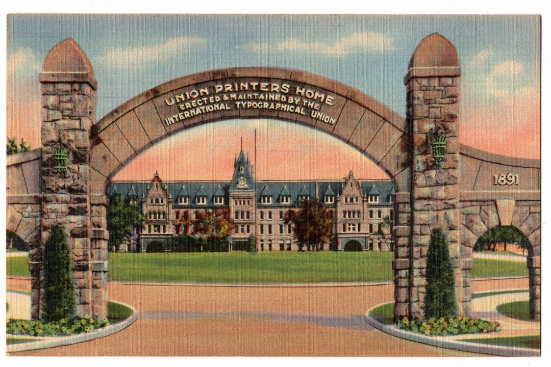 Historic stone archway with 'Union Printers' Home' inscription, leading to a large building. 1935 Union Printers Home Colorado Springs Vintage Postcard.